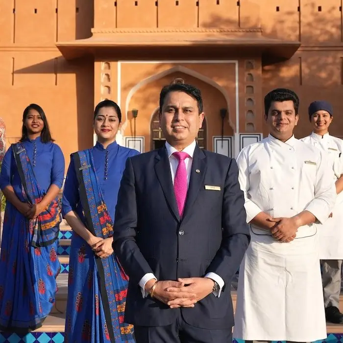 Hospitality team welcoming guests at a palace venue